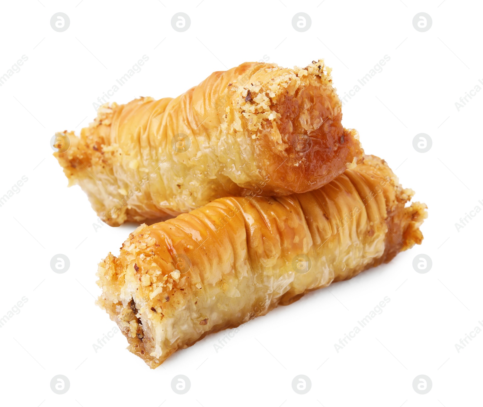 Photo of Eastern sweets. Pieces of tasty baklava isolated on white