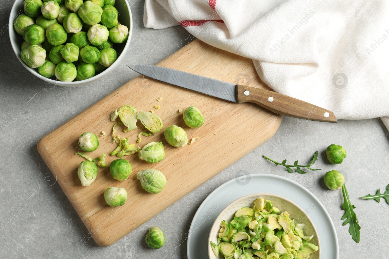 Photo of Flat lay composition with fresh Brussels sprouts on table