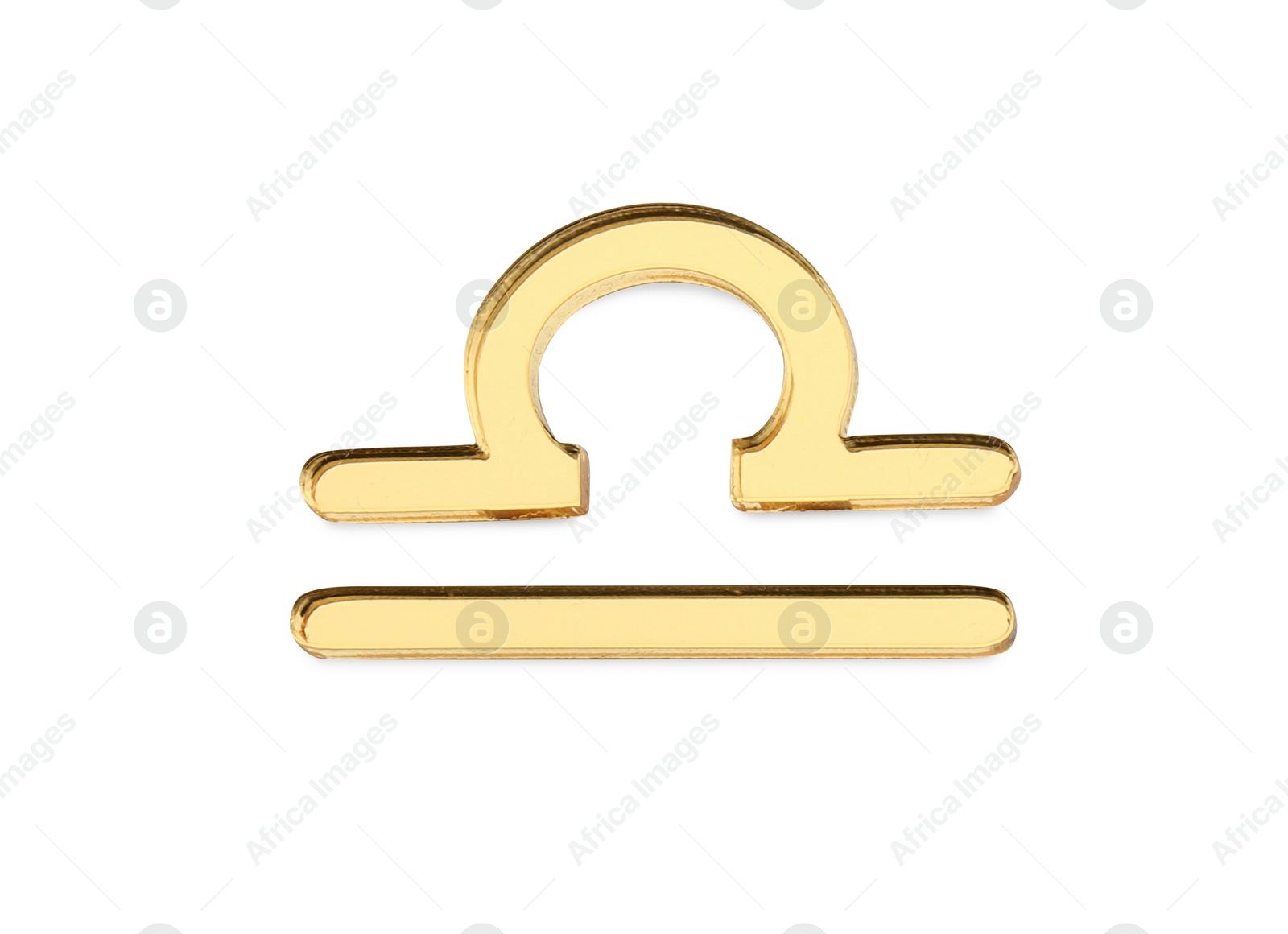 Photo of Zodiac sign. Golden Libra symbol isolated on white, top view