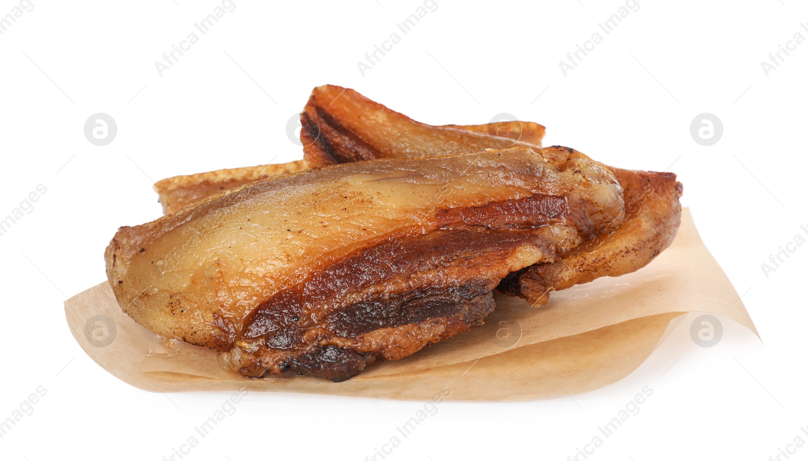 Photo of Tasty fried cracklings on white background. Cooked pork lard