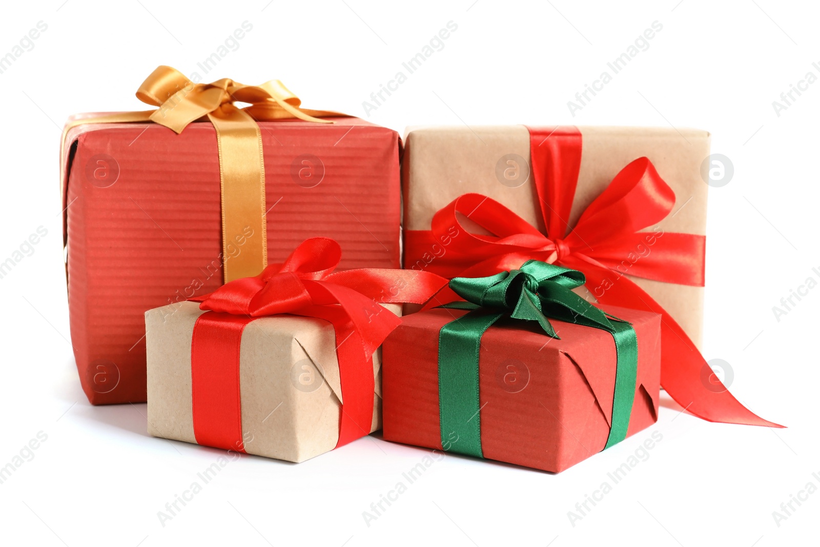 Photo of Beautifully wrapped gift boxes on white background