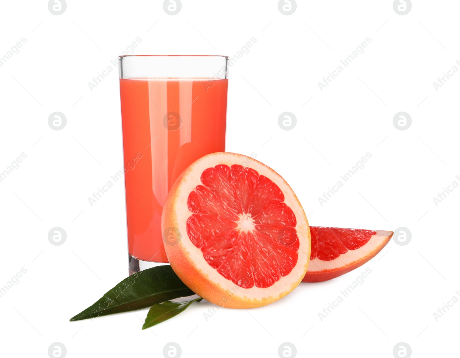 Photo of Tasty grapefruit juice in glass, leaves and fresh fruit isolated on white