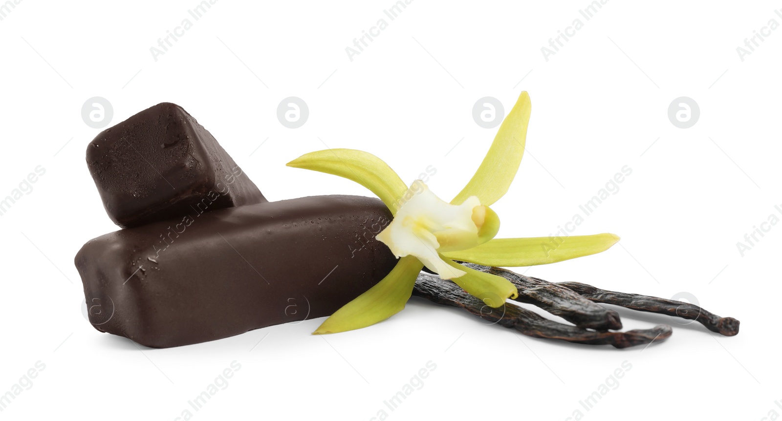 Photo of Glazed curd cheese bars, vanilla pods and flower isolated on white