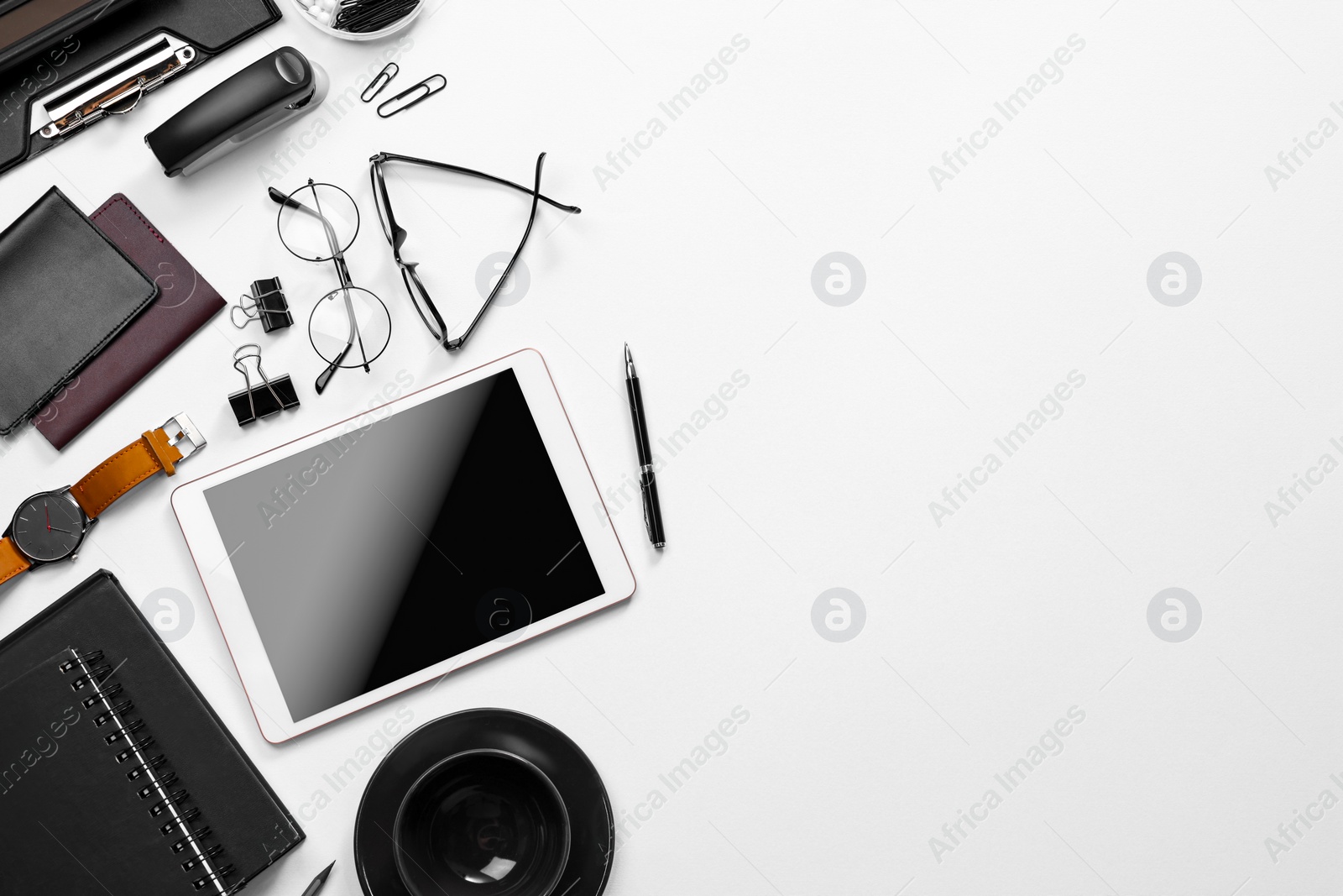 Photo of Flat lay composition with modern tablet on white background. Space for text