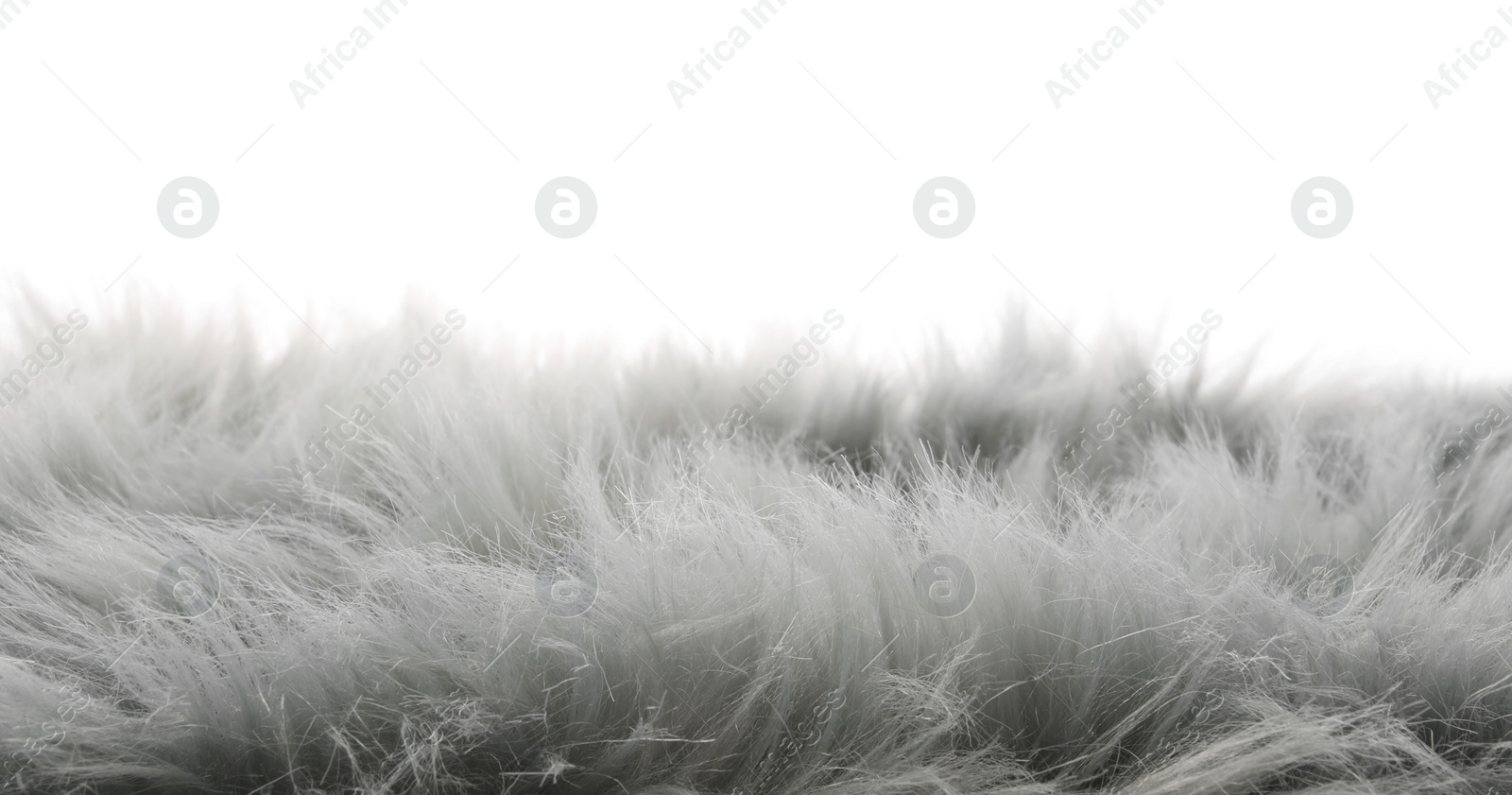 Photo of Soft grey faux fur isolated on white