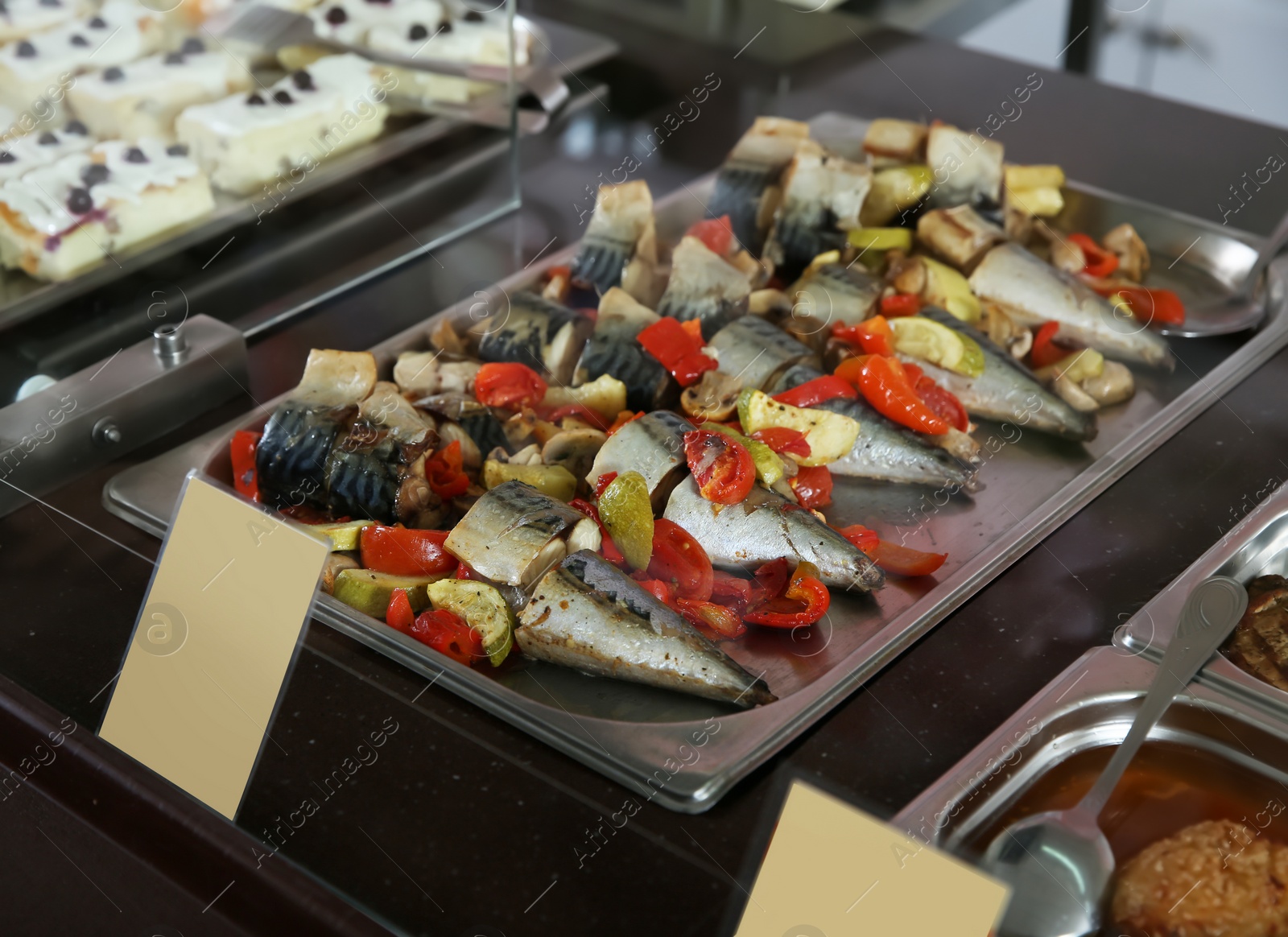 Photo of Containers with healthy food in school canteen