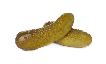 Photo of Tasty crunchy pickled cucumbers on white background