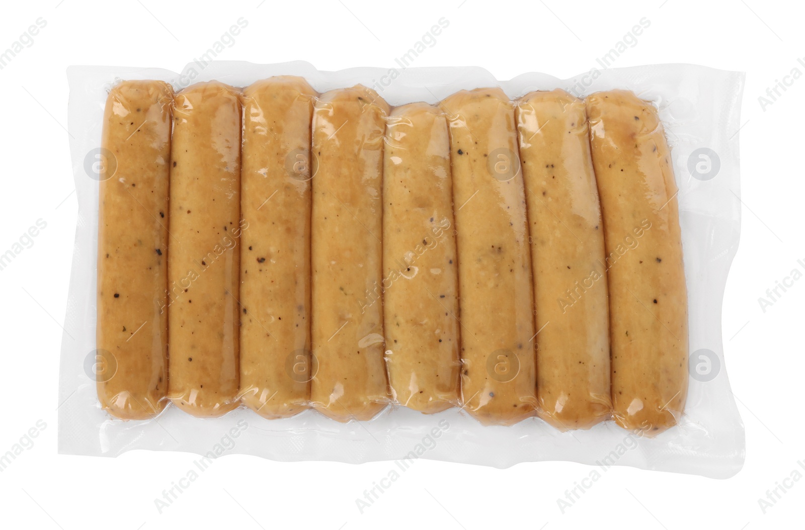 Photo of Vegan sausages with turmeric isolated on white, top view