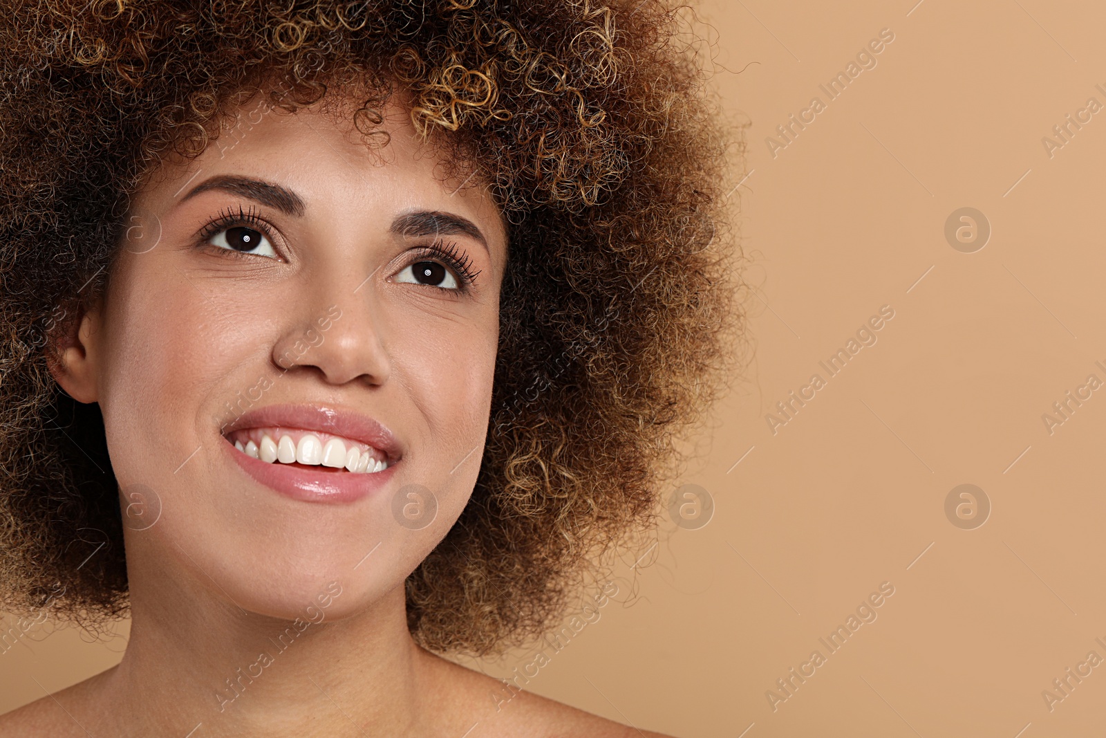 Photo of Beautiful woman with healthy skin on beige background, space for text