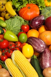 Photo of Assortment of fresh organic fruits and vegetables as background, closeup
