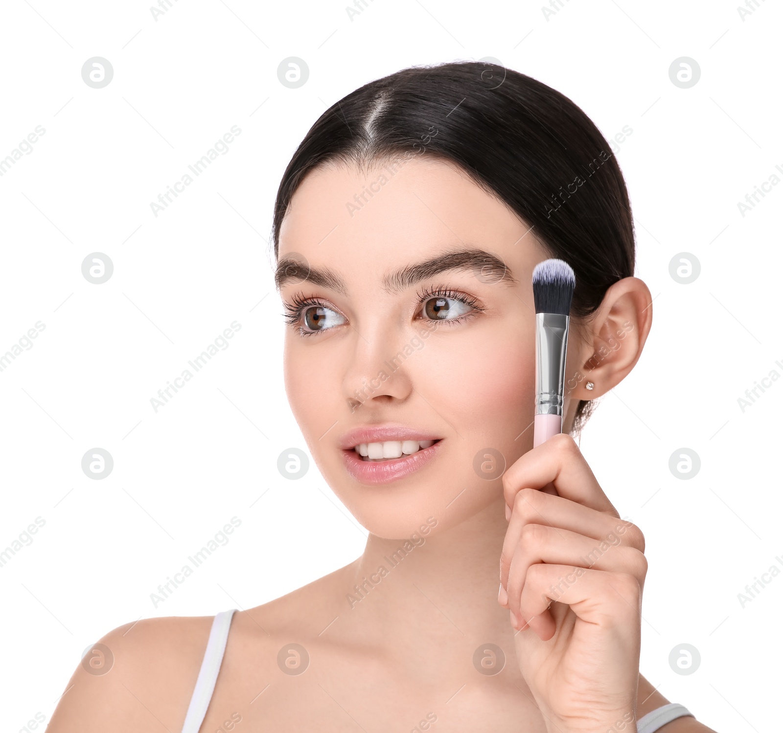 Photo of Teenage girl with makeup brush on white background