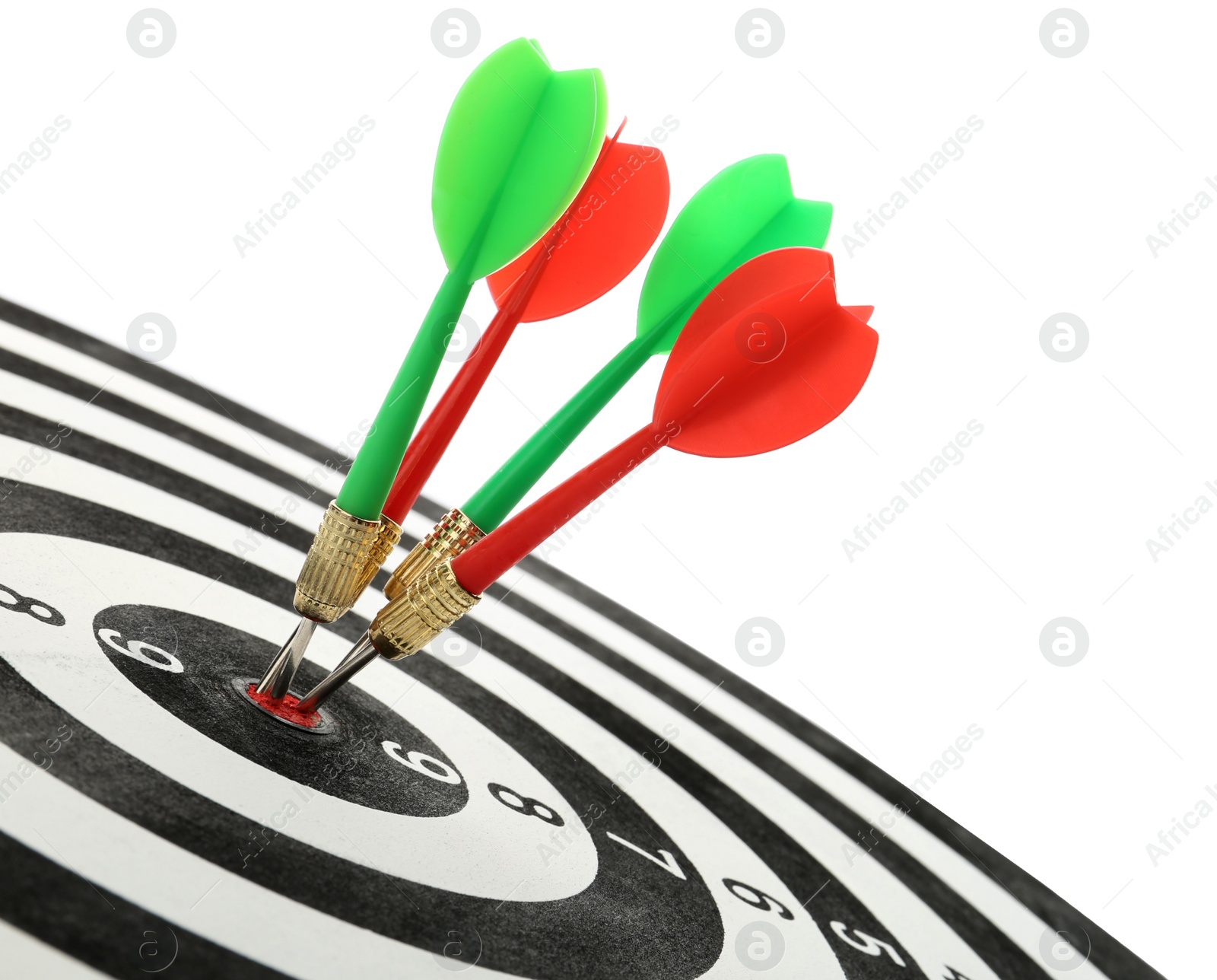 Photo of Arrows hitting target on dart board against white background