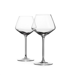 Photo of Two stylish clean glasses isolated on white