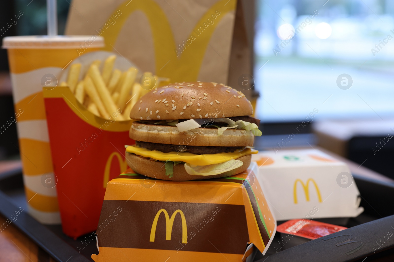 Photo of Lviv, Ukraine - October 9, 2023: McDonald's menu on table in restaurant, closeup