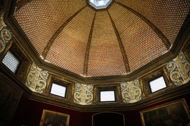 Florence, Italy - February 8, 2024: Interior of Uffizi gallery, low angle view