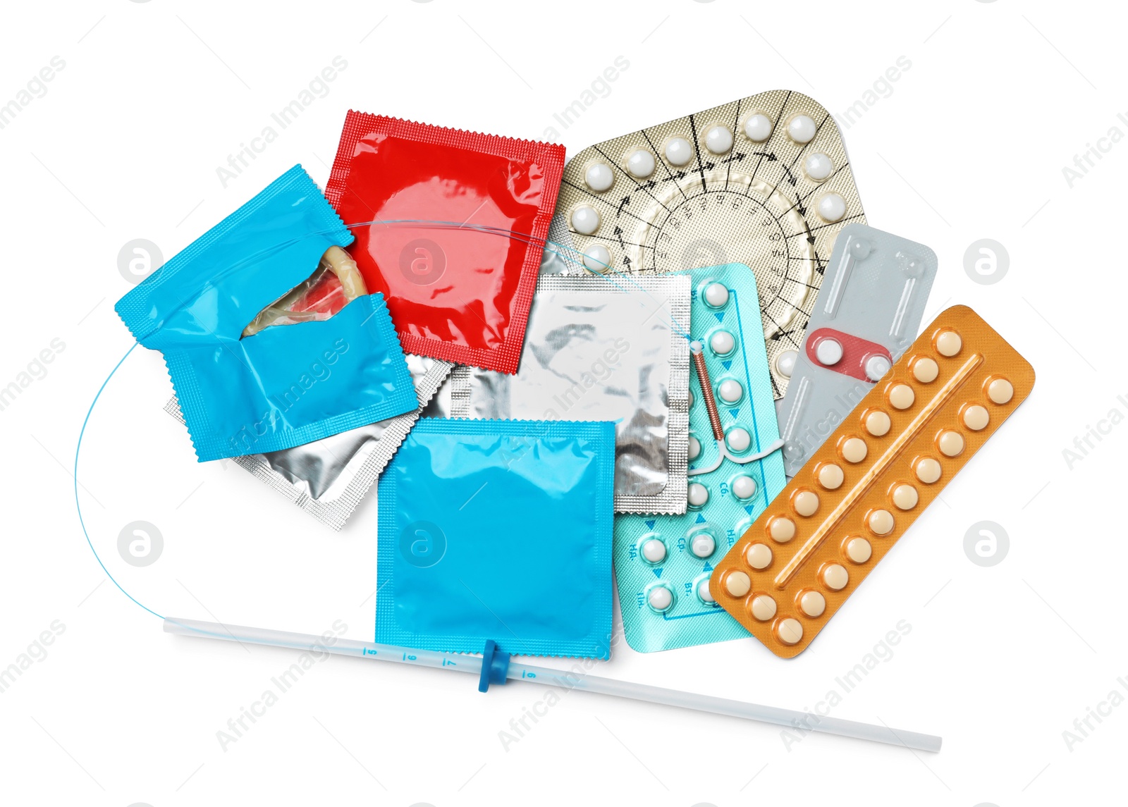 Photo of Contraceptive pills, condoms and intrauterine device isolated on white, top view. Different birth control methods