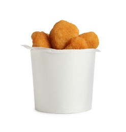 Photo of Delicious fried chicken nuggets isolated on white