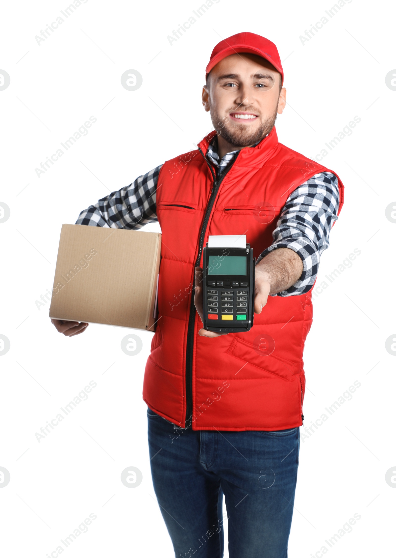 Photo of Smiling courier holding payment terminal and parcel isolated on white