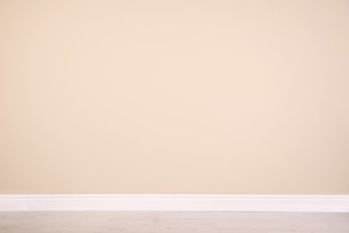 Blank beige wall in room. Space for design