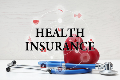 Image of Phrase Health Insurance, stethoscope, red heart and icons on light background