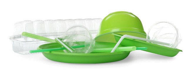 Pile of different plastic items on white background