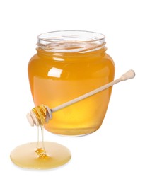 Natural honey dripping from dipper. Jar full of honey on white background