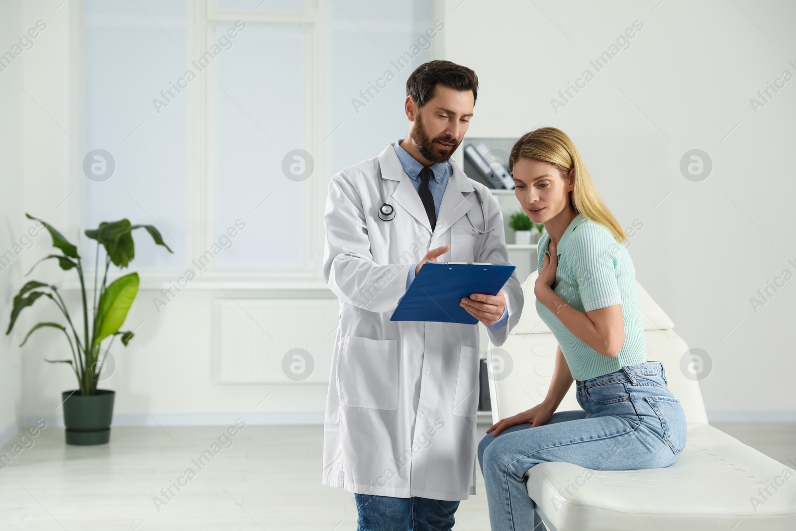 Photo of Patient having appointment with doctor in clinic