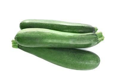 Photo of Fresh ripe green zucchinis isolated on white, top view