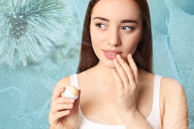 Winter skin care. Woman applying lip balm, frost effect. Beautiful forest on background
