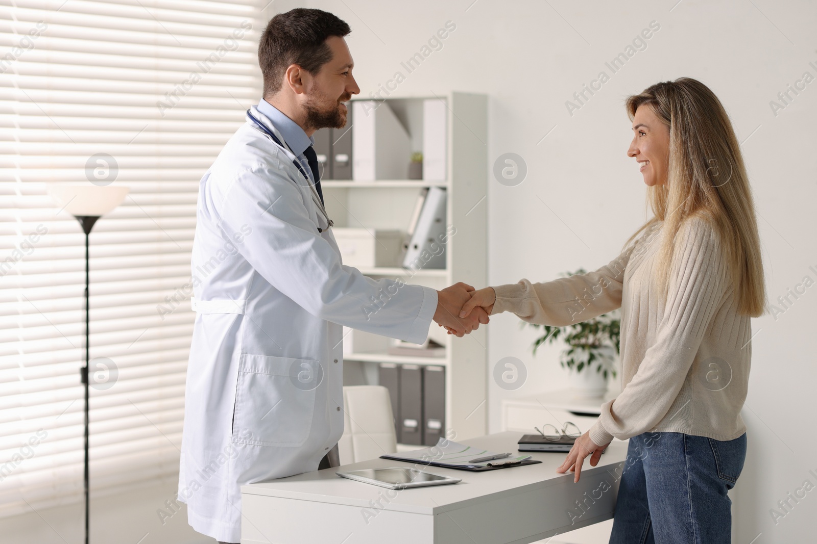 Photo of Professional doctor working with patient in hospital