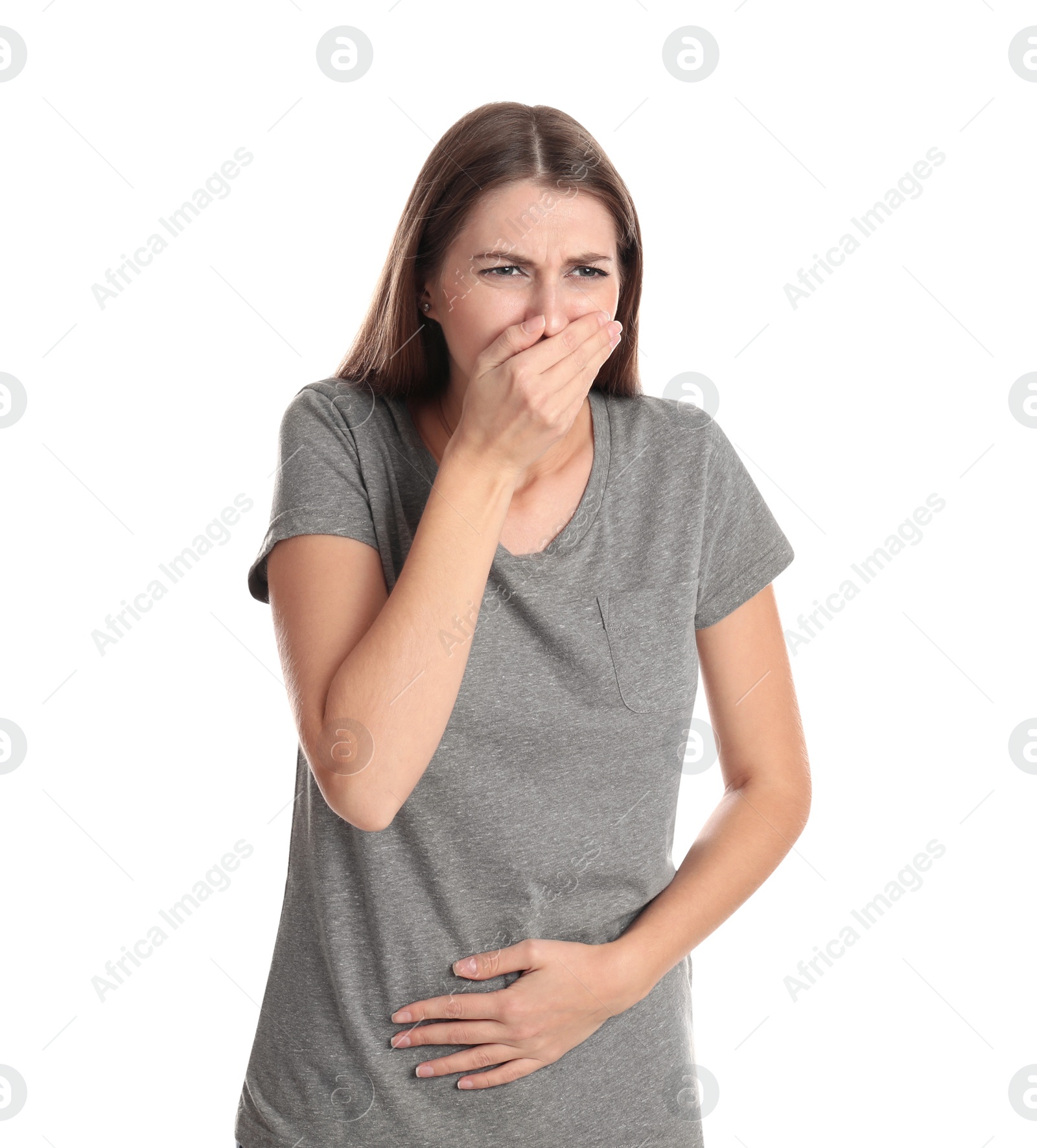 Photo of Woman suffering from nausea on white background. Food poisoning