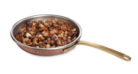 Photo of Tasty cracklings in frying pan isolated on white. Cooked pork lard