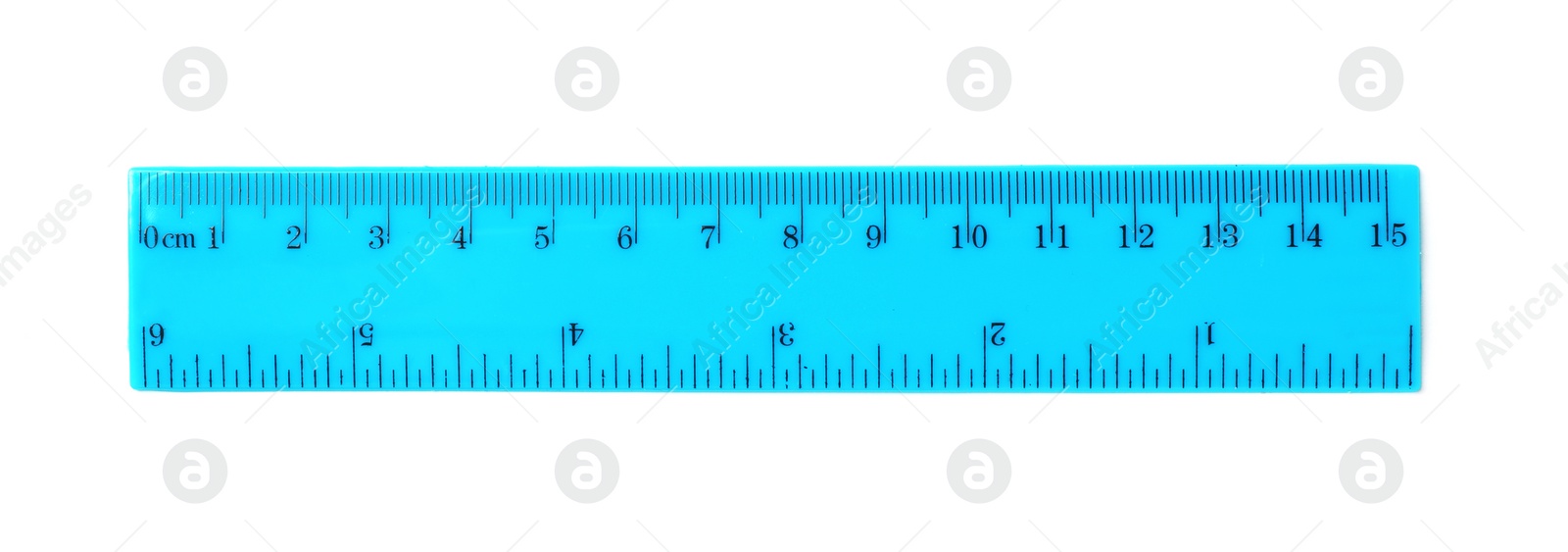 Photo of Colorful plastic ruler on white background. School stationery