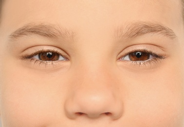 Photo of Little boy, closeup of eyes. Visiting ophthalmologist