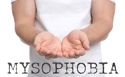 Image of Man with clean hands on white background, closeup. Mysophobia