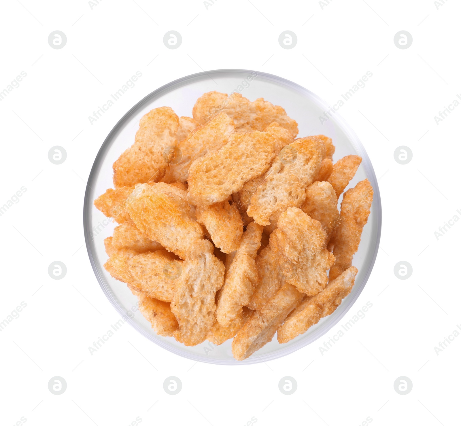 Photo of Crispy rusks with seasoning in bowl isolated on white, top view