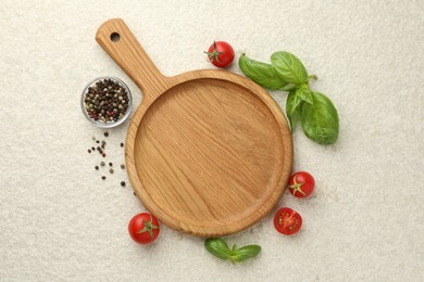 Photo of Cutting board, basil, spices and tomatoes on white textured table, flat lay. Space for text