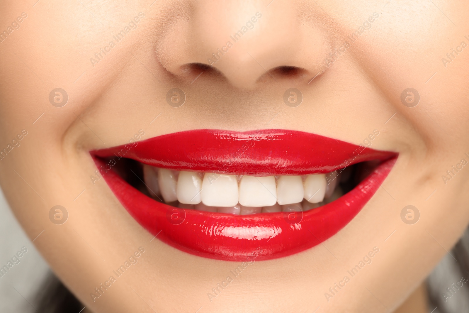 Photo of Smiling woman with healthy teeth, closeup view