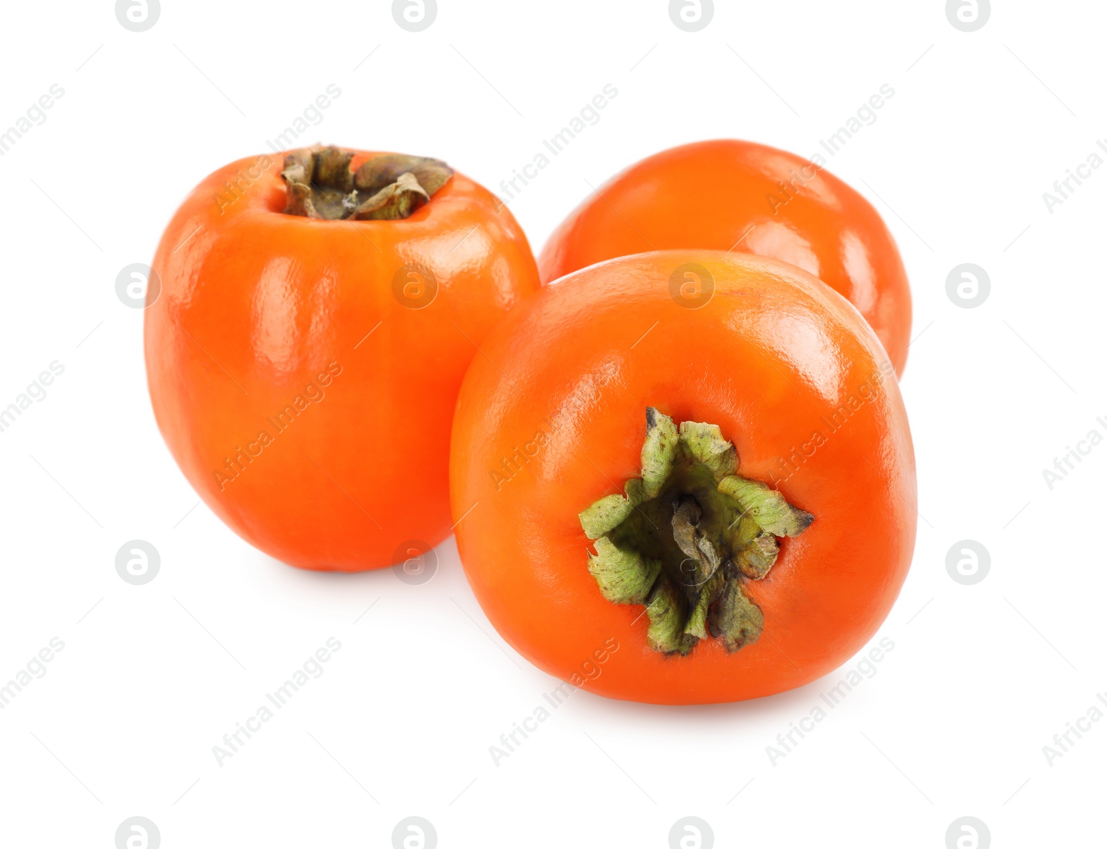 Photo of Delicious ripe juicy persimmons isolated on white