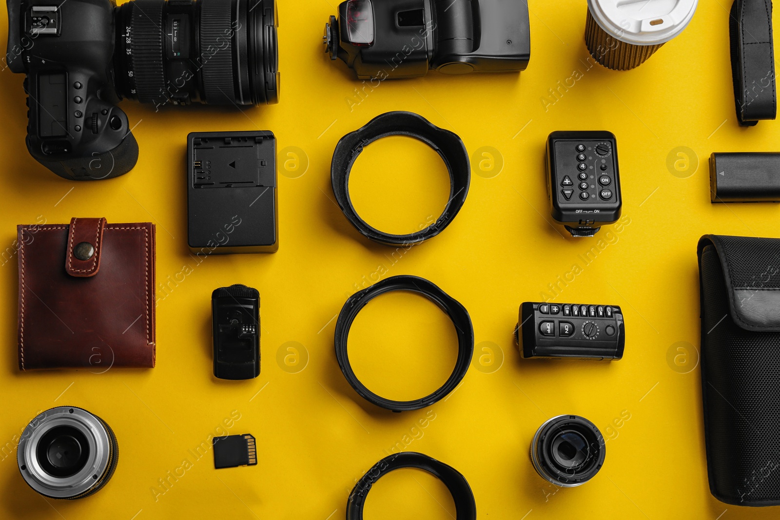 Photo of Flat lay composition with photographer's equipment and accessories on color background