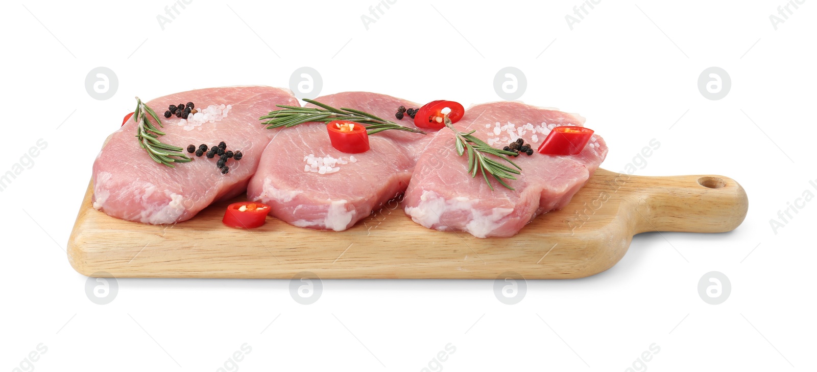 Photo of Wooden board with pieces of raw pork meat and spices isolated on white