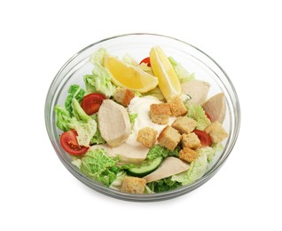 Photo of Bowl of delicious salad with Chinese cabbage, meat and bread croutons isolated on white