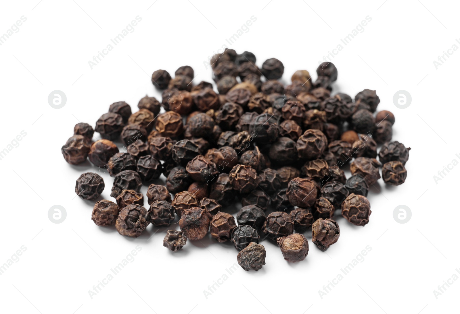 Photo of Aromatic spice. Many black dry peppercorns isolated on white