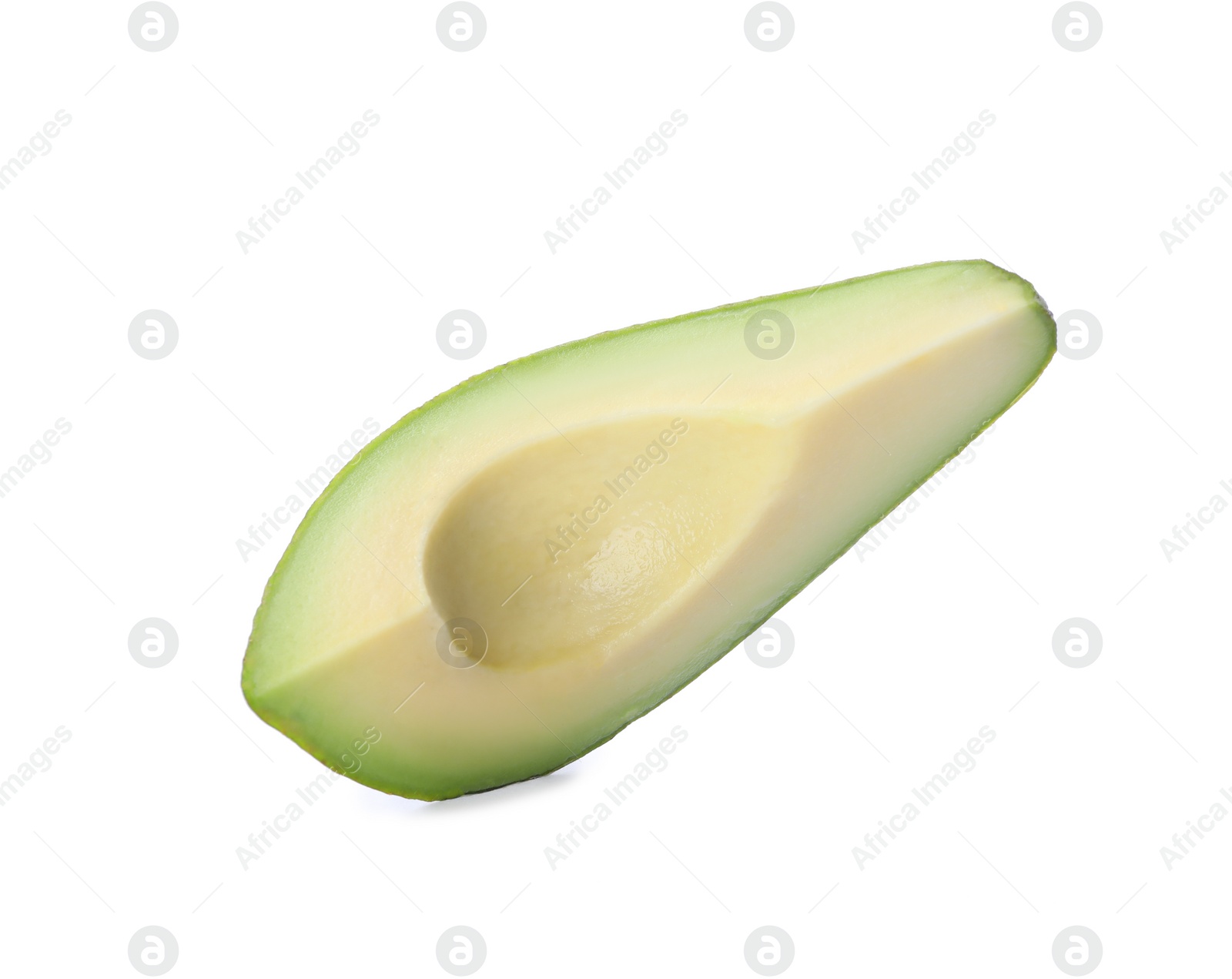 Photo of Slice of ripe avocado isolated on white