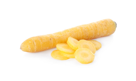 Photo of Cut and whole yellow carrots isolated on white