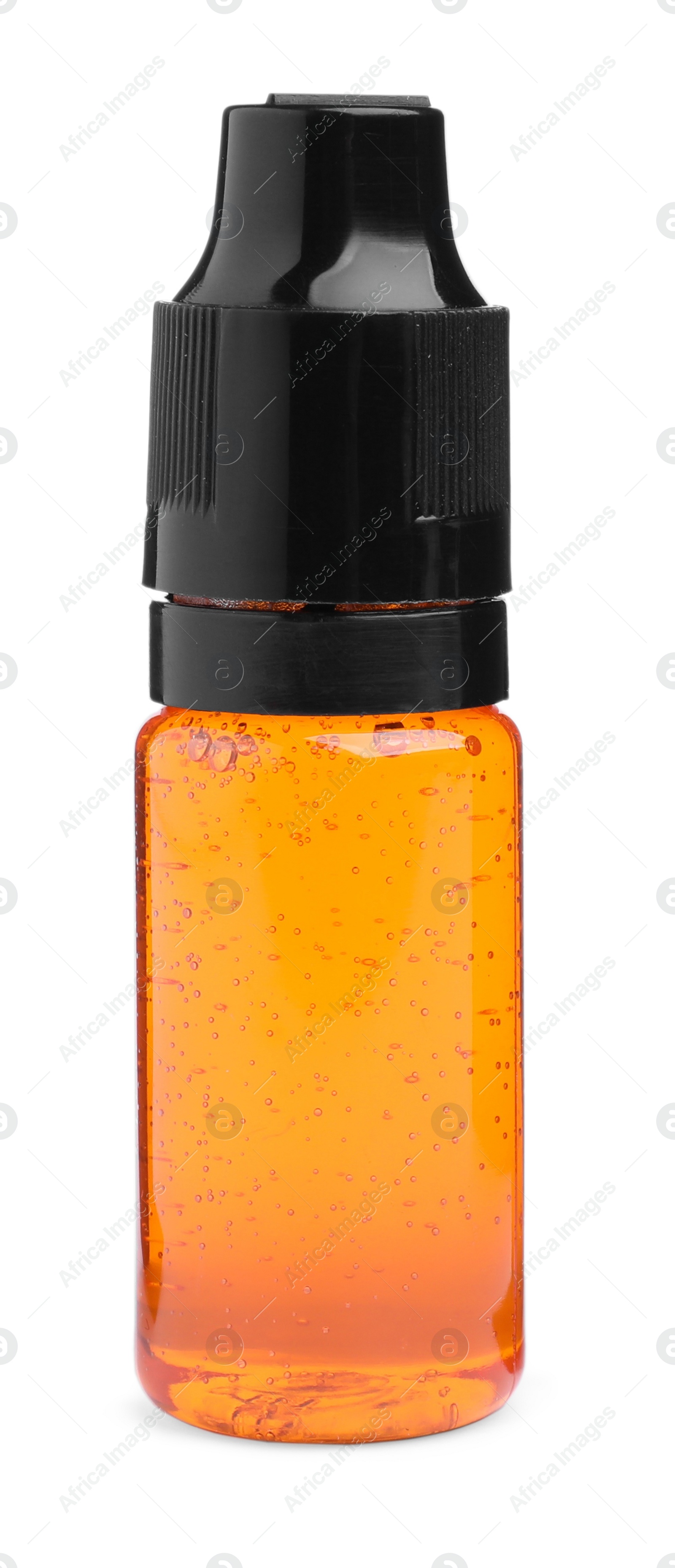 Photo of Bottle of orange food coloring on white background