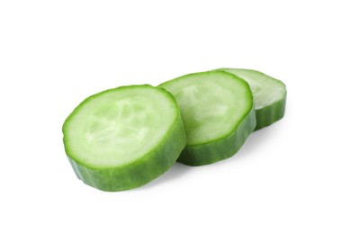 Slices of fresh green cucumber isolated on white