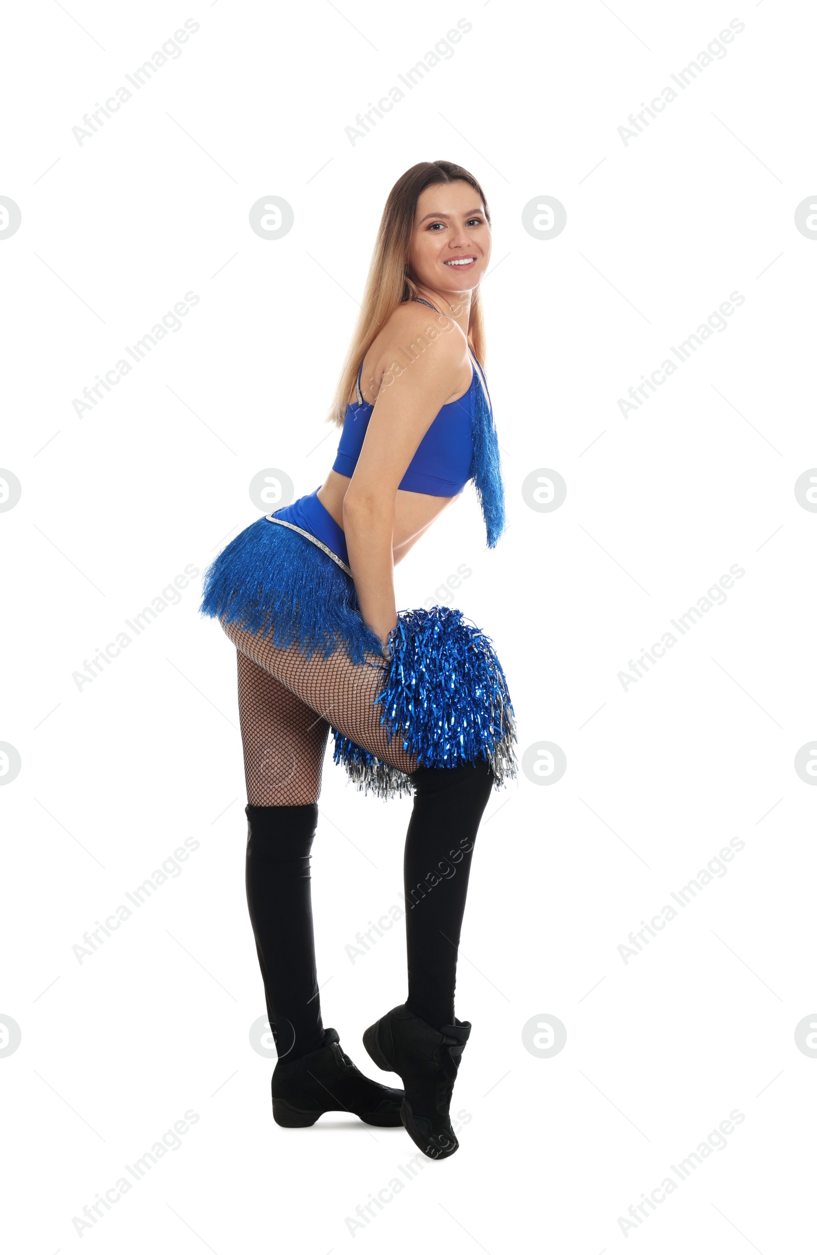 Photo of Beautiful cheerleader in costume holding pom poms on white background