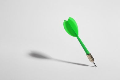 Green dart arrow for game on white background