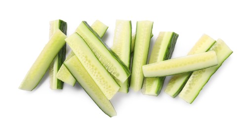 Photo of Pieces of fresh cucumber isolated on white, top view